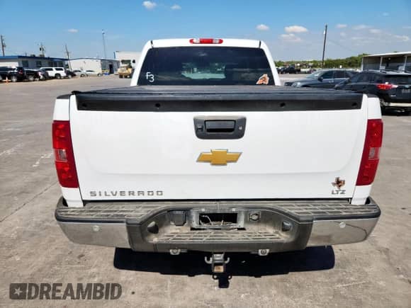 2013 Chevrolet Silverado 1500 LTZ z VIN 3GCPKTE79DG245753, wystawiony jako Copart lot #85829525 z przebiegiem 165 504 mil mil oraz Szkoda całkowita • Salvage title. Historia ofert i sprzedaży dostępna na DreamBid. Obrazek 6.