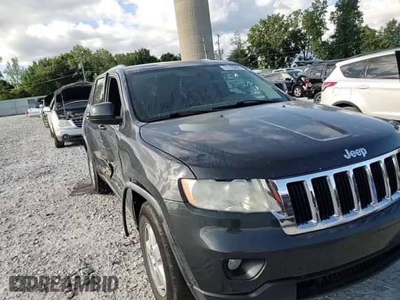 2011 Jeep Grand Cherokee Laredo с VIN 1J4RR4GG4BC590030, выставлен на аукционе Copart как лот 70199405 с пробегом 204 419 миль миль и Списание • Salvage title. История ставок и продаж доступна на DreamBid. Изображение 14.
