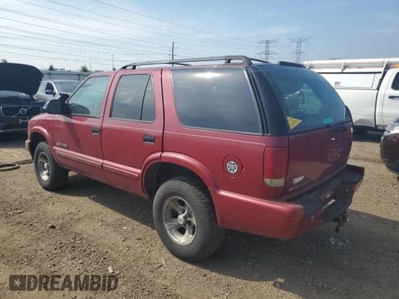 2003 Chevrolet Blazer LS с VIN 1GNCS13X33K110143, выставлен на аукционе Copart как лот 65122115 с пробегом 231 166 миль миль и Чистый • Clean title. История ставок и продаж доступна на DreamBid. Изображение 2.