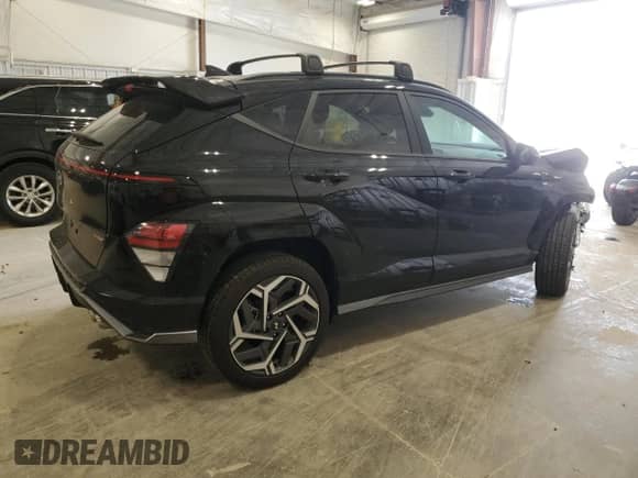 2025 Hyundai Kona N Line S with VIN KM8HBCA36SU198971, listed as a Copart auction lot 54828915 with 3,951 mi miles and Salvage title. Bid and sale history available at DreamBid. Image 3.