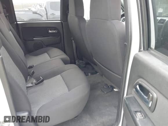 2011 Chevrolet Colorado 1LT z VIN 1GCHTCFE6B8141559, wystawiony jako IAAI lot #41812559 z przebiegiem 147 848 mil mil oraz . Historia ofert i sprzedaży dostępna na DreamBid. Obrazek 8.