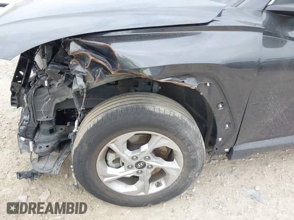 2022 Hyundai Tucson SEL z VIN 5NMJBCAEXNH088945, wystawiony jako IAAI lot #43153690 z przebiegiem 59 495 mil mil oraz . Historia ofert i sprzedaży dostępna na DreamBid. Obrazek 6.