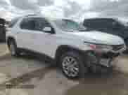 2018 Chevrolet Traverse LT Cloth z VIN 1GNERGKW1JJ229652, wystawiony jako Copart lot #58872335 z przebiegiem 184 294 mil mil oraz Szkoda całkowita • Salvage title. Historia ofert i sprzedaży dostępna na DreamBid. Obrazek 4.