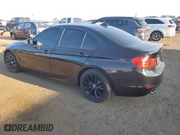 2015 BMW 3 Series 328i xDrive with VIN WBA3B3C54FF545752, listed as a Copart auction lot 69396625 with 93,400 mi miles and Salvage title. Bid and sale history available at DreamBid. Image 2.
