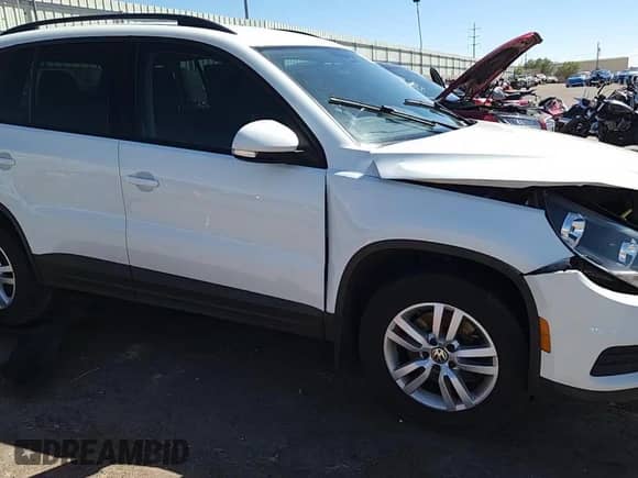 2016 Volkswagen Tiguan S z VIN WVGAV7AX0GW602944, wystawiony jako Copart lot #71832455 z przebiegiem 80 203 mil mil oraz Szkoda całkowita • Salvage title. Historia ofert i sprzedaży dostępna na DreamBid. Obrazek 13.