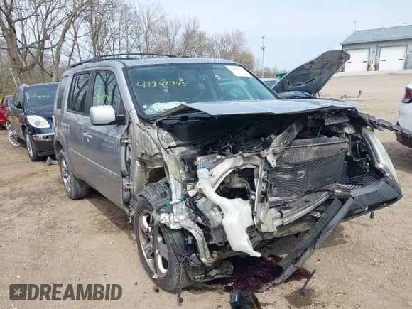 2014 Honda Pilot EX-L z VIN 5FNYF3H57EB025344, wystawiony jako IAAI lot #41941775 z przebiegiem 158 300 mil mil oraz . Historia ofert i sprzedaży dostępna na DreamBid. Obrazek 1.