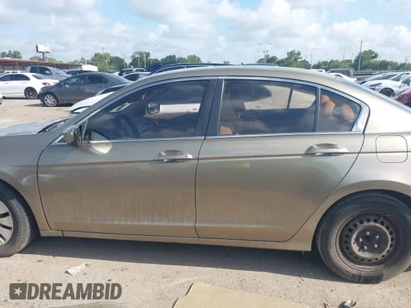 2009 Honda Accord LX with VIN 1HGCP263X9A125098, listed as a IAAI auction lot 43101217 with 200,832 mi miles and . Bid and sale history available at DreamBid. Image 14.