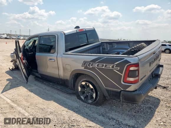 2020 Ram 1500 Rebel z VIN 1C6SRFLT4LN403520, wystawiony jako Copart lot #70288825 z przebiegiem 70 547 mil mil oraz Szkoda całkowita • Salvage title. Historia ofert i sprzedaży dostępna na DreamBid. Obrazek 2.