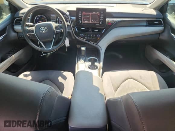 2021 Toyota Camry LE z VIN 4T1C11AK7MU600170, wystawiony jako Copart lot #81105525 z przebiegiem 87 517 mil mil oraz Szkoda całkowita • Salvage title. Historia ofert i sprzedaży dostępna na DreamBid. Obrazek 8.