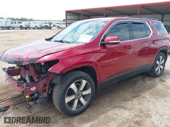 2020 Chevrolet Traverse LT z VIN 1GNEVHKW0LJ322859, wystawiony jako IAAI lot #42543694 z przebiegiem 81 159 mil mil oraz . Historia ofert i sprzedaży dostępna na DreamBid. Obrazek 19.