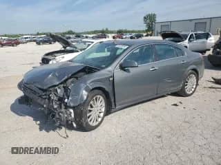 2009 Saturn Aura XR with VIN 1G8ZX57759F177022, listed as a Copart auction lot 63658885 with 154,670 mi miles and Salvage title. Bid and sale history available at DreamBid. Image 1.