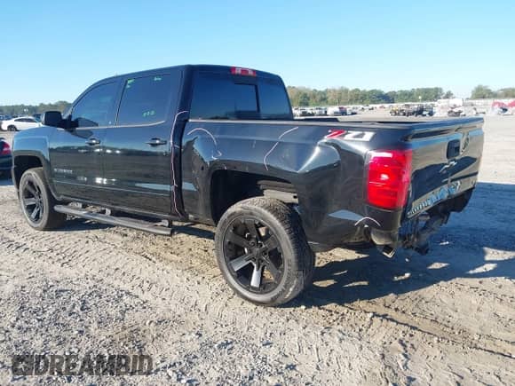 2018 Chevrolet Silverado 1500 LT z VIN 3GCUKRECXJG276511, wystawiony jako IAAI lot #43460009 z przebiegiem 151 453 mil mil oraz . Historia ofert i sprzedaży dostępna na DreamBid. Obrazek 3.