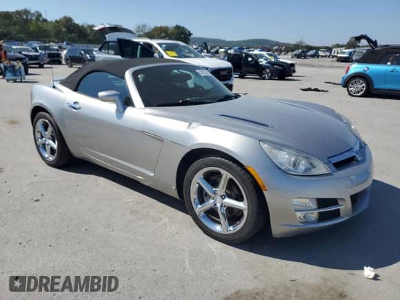 2007 Saturn Sky с VIN 1G8MB35B57Y116288, выставлен на аукционе Copart как лот 84903585 с пробегом 99 777 миль миль и Списание • Salvage title. История ставок и продаж доступна на DreamBid. Изображение 4.