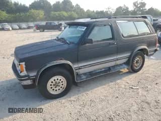 1993 Chevrolet Blazer LS с VIN 1GNCT18W9P0129018, выставлен на аукционе Copart как лот 69456244 с пробегом 93 296 миль миль и Чистый • Clean title. История ставок и продаж доступна на DreamBid. Изображение 1.