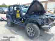 2013 Jeep Wrangler Rubicon 10th Anniversary with VIN 1C4BJWCG0DL573065, listed as a IAAI auction lot 42299018 with Not provided miles and . Bid and sale history available at DreamBid. Image 1.