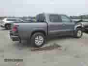 2023 Nissan Frontier Pro-4X with VIN 1N6ED1EK9PN621452, listed as a Copart auction lot 67550325 with 64,850 mi miles and Salvage title. Bid and sale history available at DreamBid. Image 3.