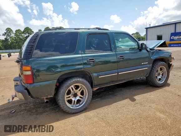 2001 Chevrolet Tahoe LT with VIN 1GNEC13T81R110727, listed as a Copart auction lot 64844605 with 218,238 mi miles and Salvage title. Bid and sale history available at DreamBid. Image 3.