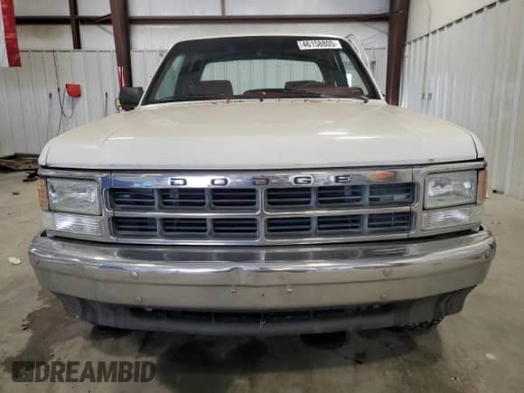 1993 Dodge Dakota z VIN 1B7FL23X3PS180403, wystawiony jako Copart lot #46158805 z przebiegiem Nie podano mil oraz Szkoda całkowita • Salvage title. Historia ofert i sprzedaży dostępna na DreamBid. Obrazek 5.