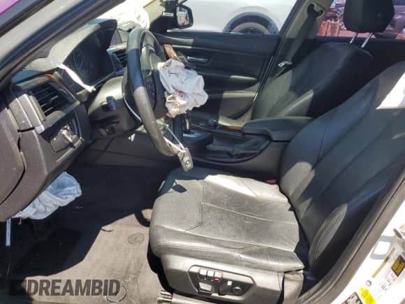 2013 BMW 3 Series 328i xDrive with VIN WBA3B3C50DF542473, listed as a Copart auction lot 69501165 with 136,590 mi miles and Salvage title. Bid and sale history available at DreamBid. Image 7.