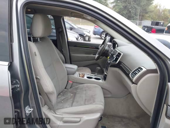 2012 Jeep Grand Cherokee Laredo with VIN 1C4RJFAG3CC272631, listed as a IAAI auction lot 43291923 with 168,220 mi miles and . Bid and sale history available at DreamBid. Image 5.