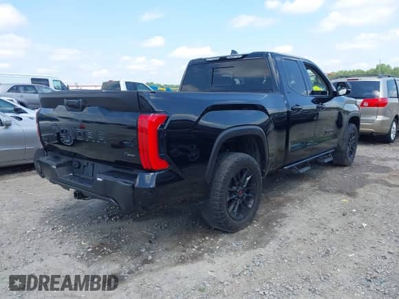 2024 Toyota Tundra SR5 with VIN 5TFLA5DA5RX163743, listed as a IAAI auction lot 42474318 with 30,136 mi miles and . Bid and sale history available at DreamBid. Image 4.