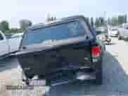 2018 Toyota Tacoma SR5 z VIN 5TFSZ5AN2JX151257, wystawiony jako IAAI lot #42895721 z przebiegiem 157 990 mil mil oraz . Historia ofert i sprzedaży dostępna na DreamBid. Obrazek 16.