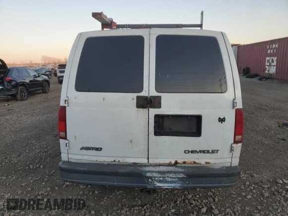 2005 Chevrolet Astro Cargo с VIN 1GCDM19X05B118797, выставлен на аукционе Copart как лот 84093974 с пробегом Не указан миль и Списание • Salvage title. История ставок и продаж доступна на DreamBid. Изображение 6.