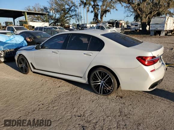 2016 BMW 7 Series 750i xDrive with VIN WBA7B0C59GG526741, listed as a Copart auction lot 86312384 with 90,360 mi miles and Salvage title. Bid and sale history available at DreamBid. Image 2.