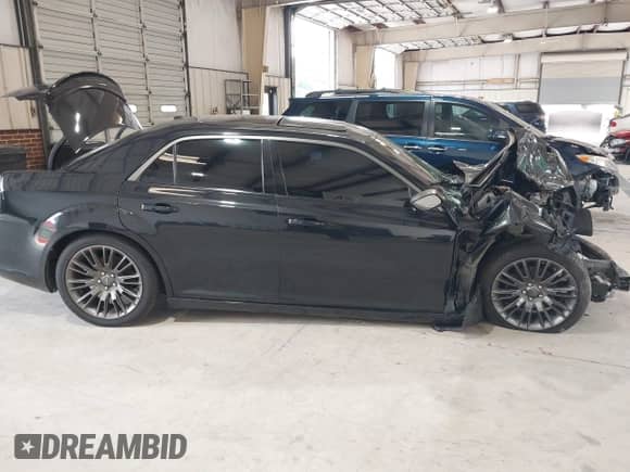 2013 Chrysler 300 C John Varvatos Limited Edition with VIN 2C3CCADG3DH709643, listed as a IAAI auction lot 42601096 with 127,514 mi miles and . Bid and sale history available at DreamBid. Image 12.