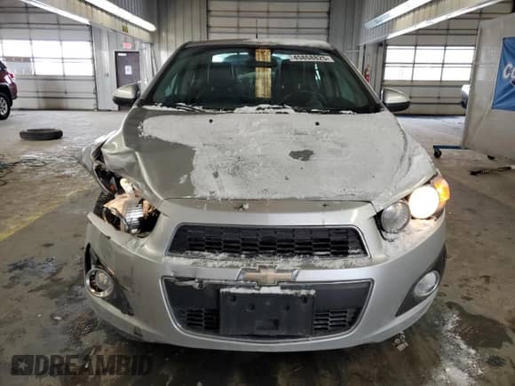 2013 Chevrolet Sonic LTZ z VIN 1G1JE5SH3D4123997, wystawiony jako Copart lot #45868825 z przebiegiem 120 913 mil mil oraz Szkoda całkowita • Salvage title. Historia ofert i sprzedaży dostępna na DreamBid. Obrazek 5.