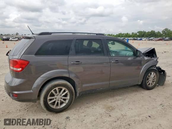 2017 Dodge Journey SXT with VIN 3C4PDCBB8HT677007, listed as a Copart auction lot 66101285 with 117,202 mi miles and Salvage title. Bid and sale history available at DreamBid. Image 3.