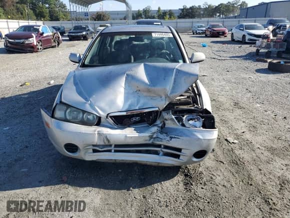 2003 Hyundai Elantra GLS с VIN KMHDN45D03U579067, выставлен на аукционе Copart как лот 71446405 с пробегом 156 602 миль миль и Списание • Salvage title. История ставок и продаж доступна на DreamBid. Изображение 5.