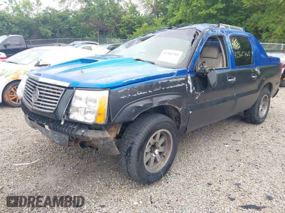 2002 Cadillac Escalade EXT z VIN 3GYEK63N02G210858, wystawiony jako IAAI lot #42365765 z przebiegiem 217 257 mil mil oraz . Historia ofert i sprzedaży dostępna na DreamBid. Obrazek 2.