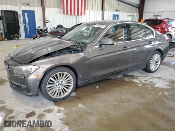 2015 BMW 3 Series 328i xDrive with VIN WBA3B3G59FNR86938, listed as a Copart auction lot 66036875 with 113,149 mi miles and Salvage title. Bid and sale history available at DreamBid. Image 1.