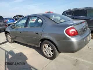 2005 Dodge Neon SXT z VIN 1B3ES56C45D133814, wystawiony jako Copart lot #83533794 z przebiegiem 179 574 mil mil oraz Szkoda całkowita • Salvage title. Historia ofert i sprzedaży dostępna na DreamBid. Obrazek 2.