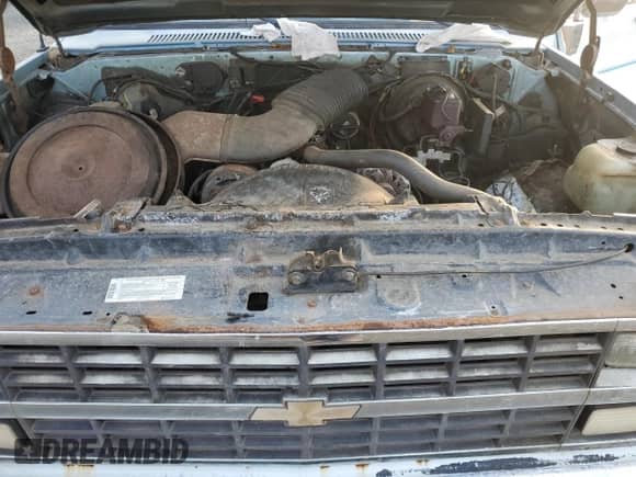 1990 Chevrolet Suburban с VIN 1GNGV26K8LF160480, выставлен на аукционе Copart как лот 83665974 с пробегом 246 841 миль миль и Чистый • Clean title. История ставок и продаж доступна на DreamBid. Изображение 12.