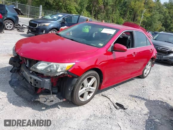 2014 Toyota Camry SE Sport with VIN 4T1BF1FK2EU864579, listed as a IAAI auction lot 43129777 with 111,115 mi miles and . Bid and sale history available at DreamBid. Image 2.