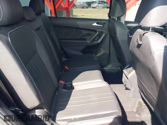 2023 Volkswagen Tiguan SE with VIN 3VVNB7AX7PM058281, listed as a IAAI auction lot 42748892 with 53,572 mi miles and . Bid and sale history available at DreamBid. Image 8.