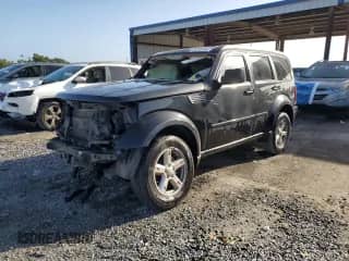 2008 Dodge Nitro SXT с VIN 1D8GT28K18W238408, выставлен на аукционе Copart как лот 85260045 с пробегом 214 697 миль миль и На запчасти • Non repairable. История ставок и продаж доступна на DreamBid. Изображение 1.