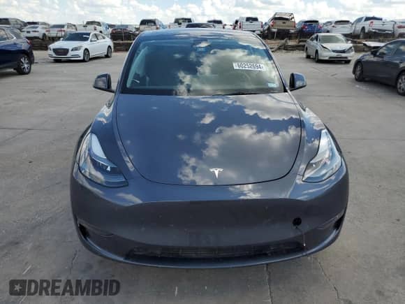 2023 Tesla Model Y Long Range с VIN 7SAYGDEE1PA166467, выставлен на аукционе Copart как лот 60252694 с пробегом 20 216 миль миль и Списание • Salvage title. История ставок и продаж доступна на DreamBid. Изображение 5.