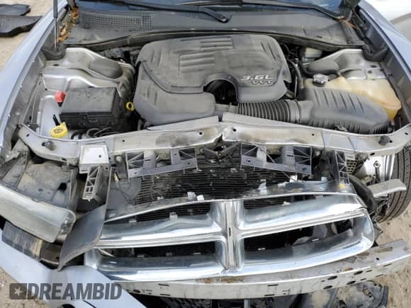 2013 Dodge Charger SE z VIN 2C3CDXBG2DH591751, wystawiony jako Copart lot #82155484 z przebiegiem 232 207 mil mil oraz Szkoda całkowita • Salvage title. Historia ofert i sprzedaży dostępna na DreamBid. Obrazek 11.