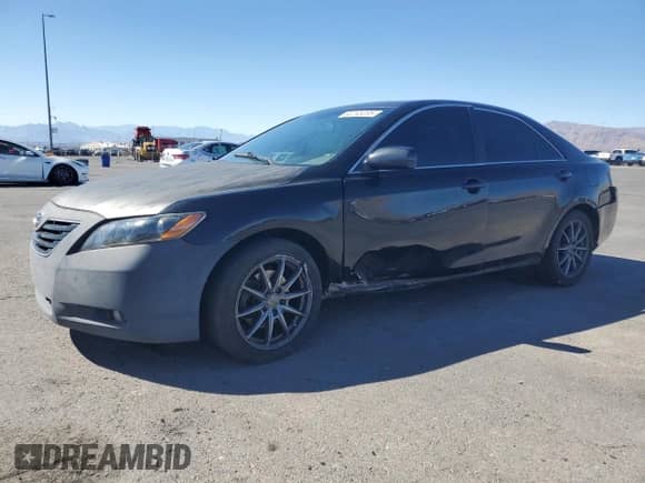 2007 Toyota Camry XLE with VIN 4T1BK46K97U542909, listed as a Copart auction lot 82245205 with 177,661 mi miles and Salvage title. Bid and sale history available at DreamBid. Image 1.