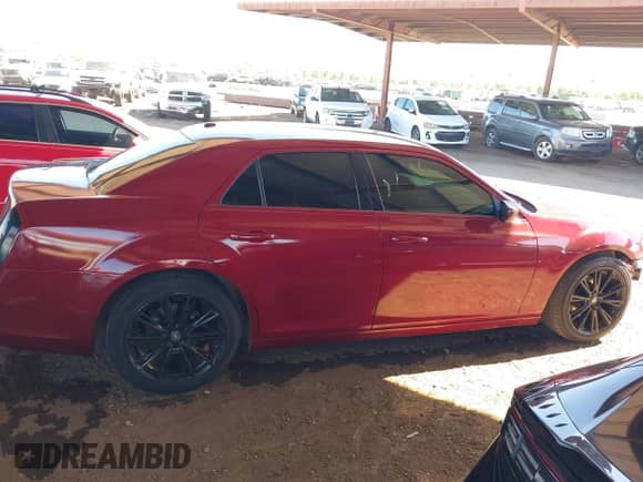 2012 Chrysler 300 Limited z VIN 2C3CCACG9CH265863, wystawiony jako IAAI lot #43479610 z przebiegiem 98 212 mil mil oraz . Historia ofert i sprzedaży dostępna na DreamBid. Obrazek 14.