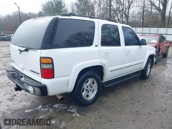 2005 Chevrolet Tahoe LS with VIN 1GNEC13T35J117010, listed as a IAAI auction lot 41575466 with 226,930 mi miles and . Bid and sale history available at DreamBid. Image 4.