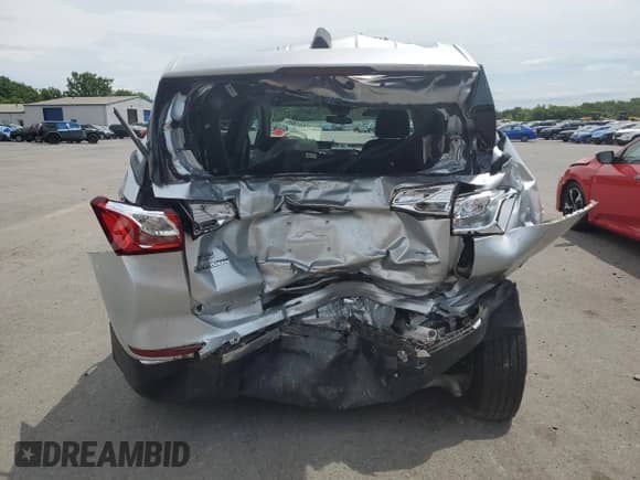 2020 Chevrolet Equinox LT z VIN 3GNAXUEV2LS528221, wystawiony jako Copart lot #65551805 z przebiegiem Nie podano mil oraz Szkoda całkowita • Salvage title. Historia ofert i sprzedaży dostępna na DreamBid. Obrazek 6.