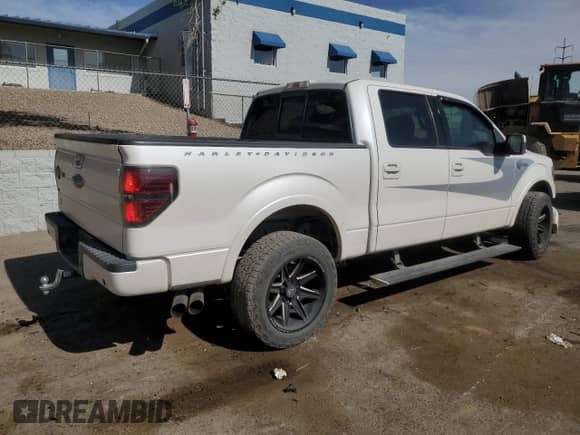2012 Ford F-150 Lariat with VIN 1FTFW1E68CFB85590, listed as a Copart auction lot 58897445 with 131,901 mi miles and Salvage title. Bid and sale history available at DreamBid. Image 3.