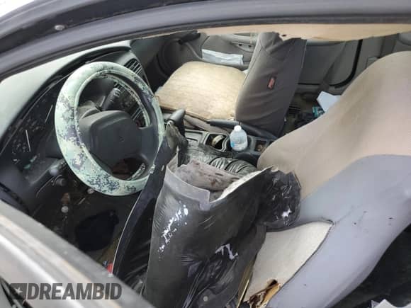 2001 Saturn SC with VIN 1G8ZP12851Z215716, listed as a Copart auction lot 69665754 with Not provided miles and Salvage title. Bid and sale history available at DreamBid. Image 7.