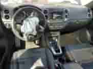 2014 Volkswagen Tiguan S с VIN WVGBV3AX2EW031578, выставлен на аукционе Copart как лот 83960015 с пробегом 101 454 миль миль и Списание • Salvage title. История ставок и продаж доступна на DreamBid. Изображение 8.