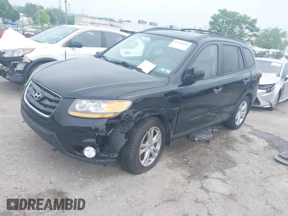 2010 Hyundai Santa Fe Limited with VIN 5NMSKDAG2AH379056, listed as a IAAI auction lot 42284680 with 52,780 mi miles and . Bid and sale history available at DreamBid. Image 2.