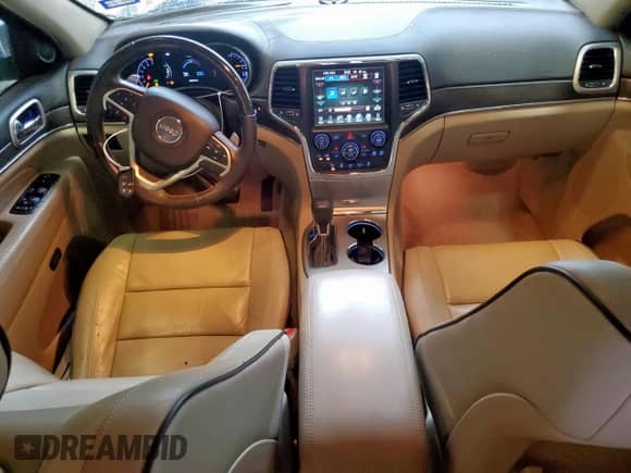 2017 Jeep Grand Cherokee Overland with VIN 1C4RJECG9HC916342, listed as a Copart auction lot 60658285 with 59,470 mi miles and Salvage title. Bid and sale history available at DreamBid. Image 8.